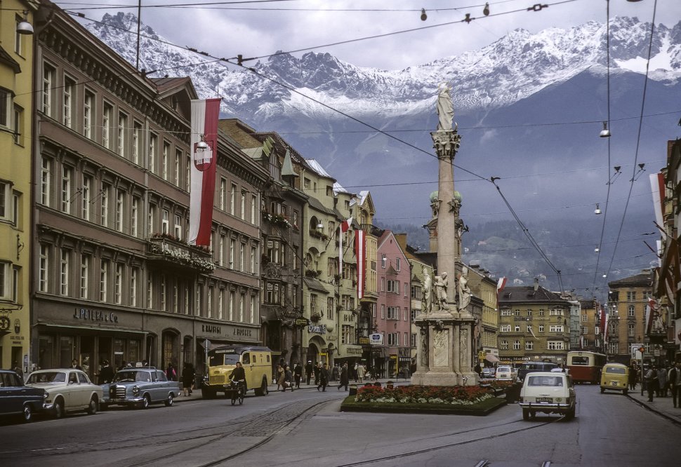 Free image of View from street of snow capped mountain tops in the distance. Innsbruck, Austria.