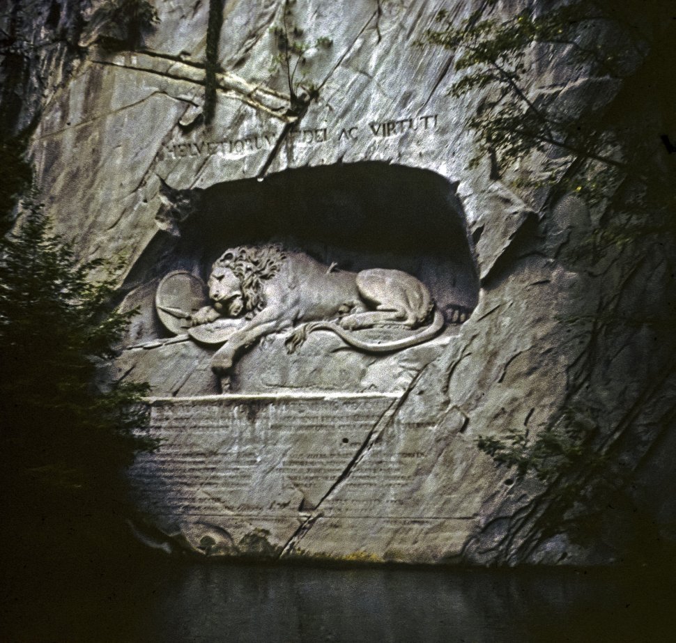Free image of Stone carving of a lion on the side of a cliff. The Lion Monument is a sculpture in Lucerne, Switzerland, designed by Bertel Thorvaldsen. It commemorates the Swiss Guards who were massacred in 1792 during the French Revolution