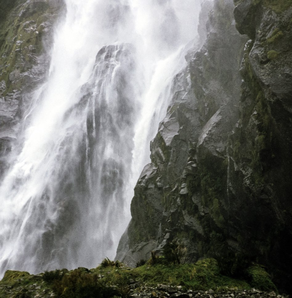 Free image of Scenic image of a waterfall and cliff.