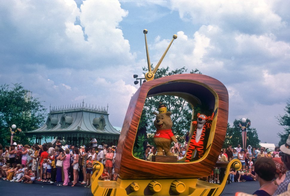 Free image of Winnie the Pooh and Tigger characters riding on a float at the Disneyland parade, Anaheim, California, USA