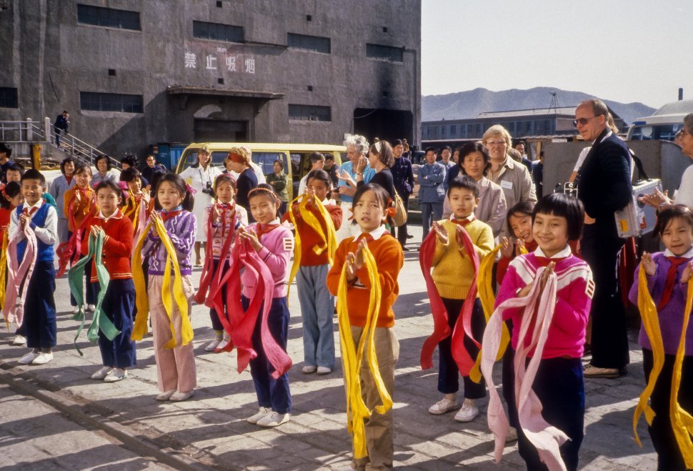 Free image of Group of school children doing a performance for a crowd, Asia