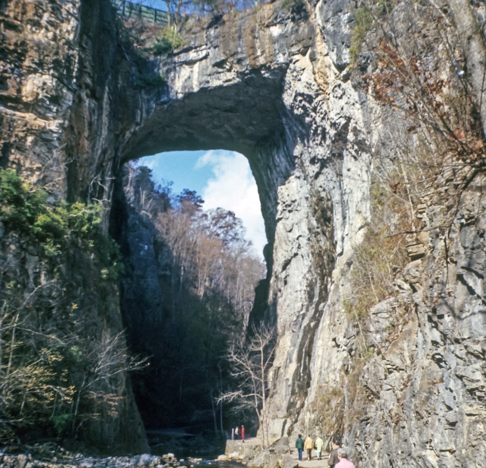 Free image of Huge Natural Bridge with tourists walking through it. Virginia, USA