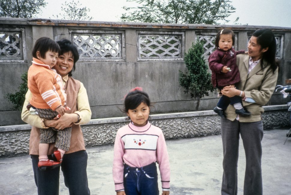 Free image of Women and young girls posing for photograph, China