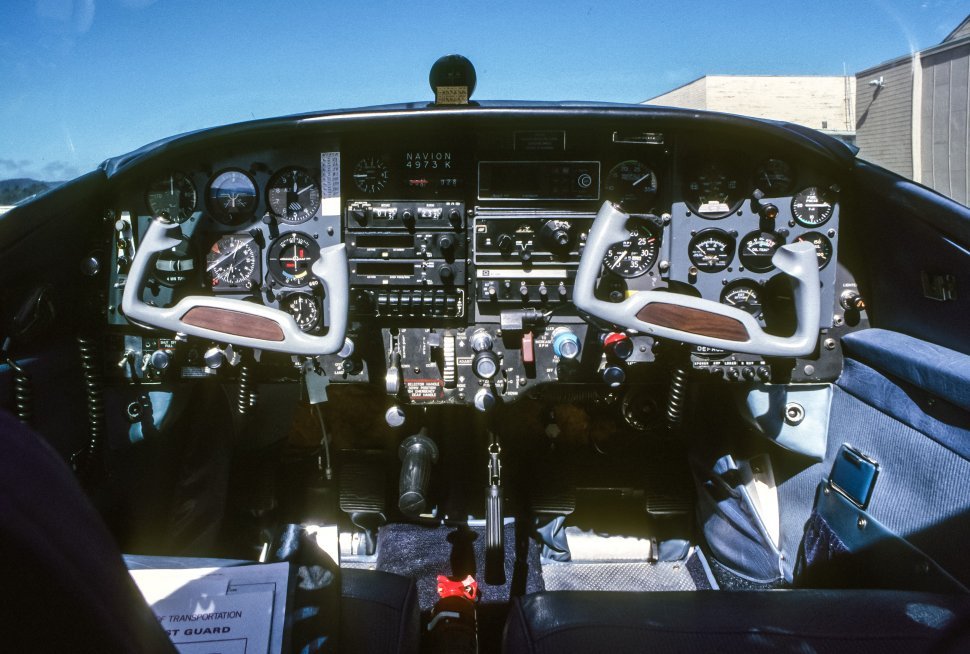 Free image of View of the cockpit of a small plane and it s controls.
