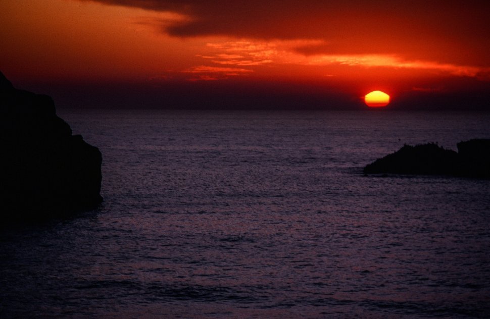 Free image of Sunset over the coast of Bandon Beach in Oregon, USA