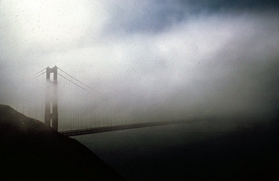 Free image of Early morning fog engulfs Golden Gate Bridge in San Francisco, California, USA